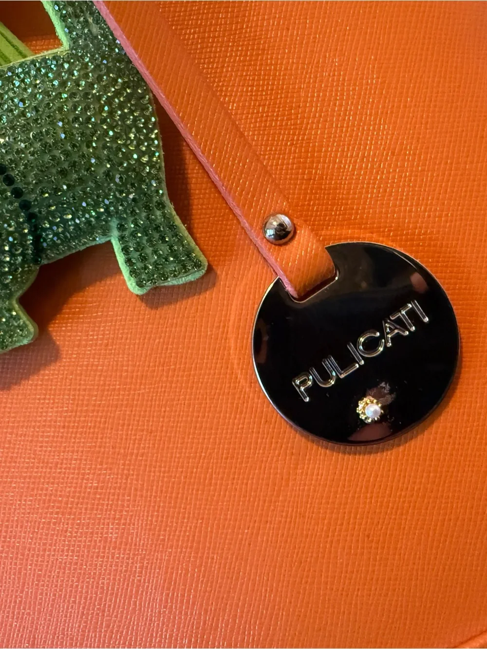 Pulicati Orange Dome Satchel with Green Dinosaur Charm